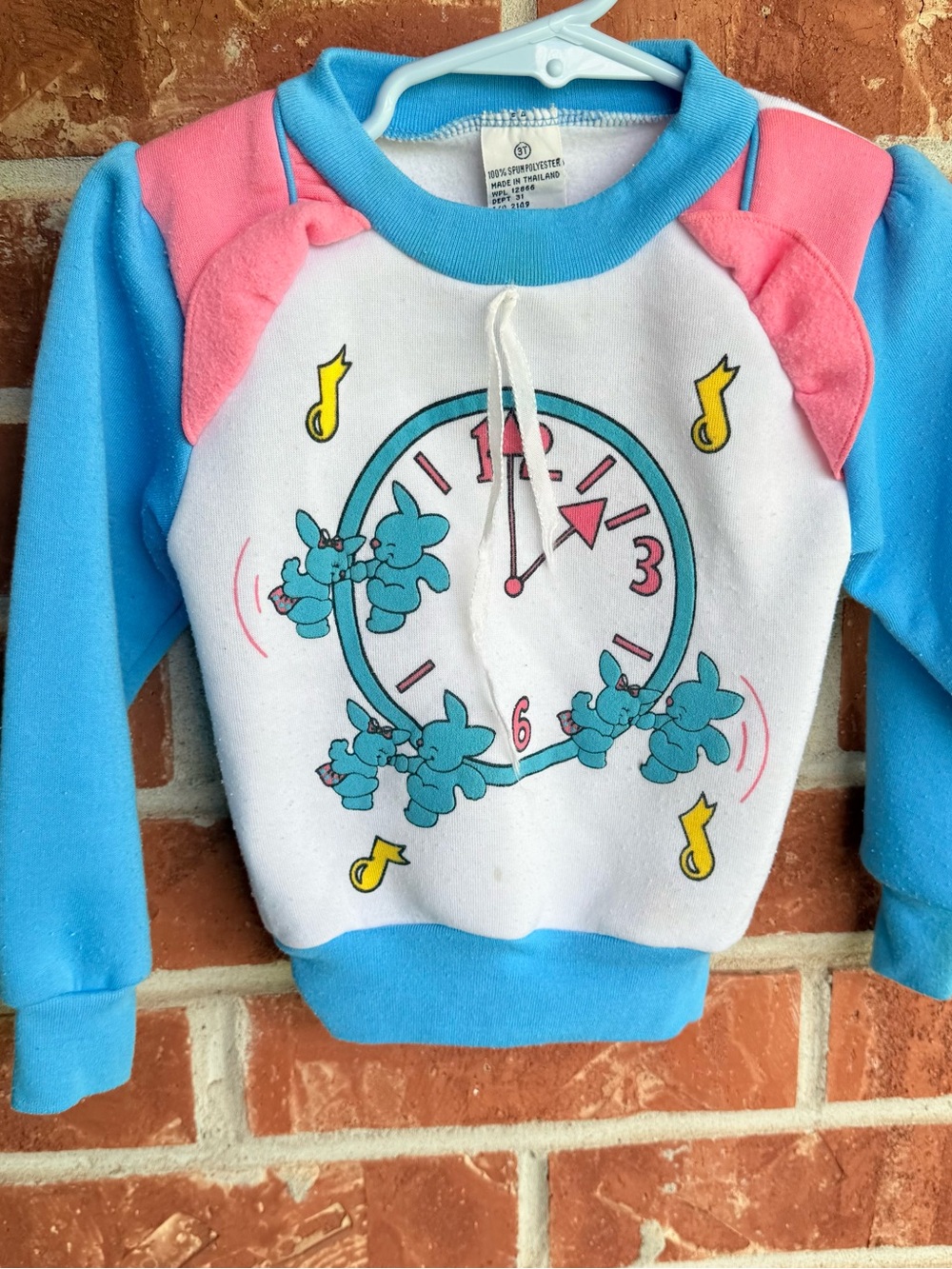 Vintage 90s sweatshirt with dancing bunnies and clock design